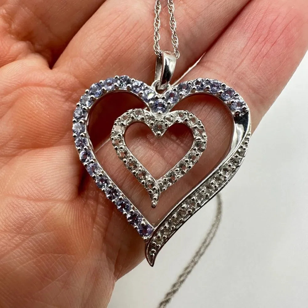 Genuine 1.5ctw tanzanite and‎ CZ accent heart necklace in sterling silver!